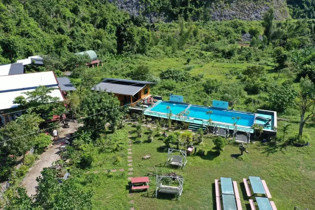 Cat Ba Love House outdoor pool with mountain scenery in Cat Ba, Vietnam